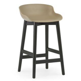 Normann Copenhagen Hyg black oak bar stool with polypropylene seat h. 65 cm. Normann Copenhagen Hyg Sand - Buy now on ShopDecor - Discover the best products by NORMANN COPENHAGEN design